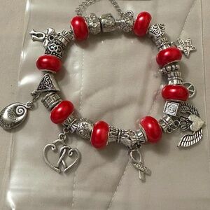 Handmade – NWOT – 925SS plated charm bracelet. 8 lg fuchsia beads, charm variety